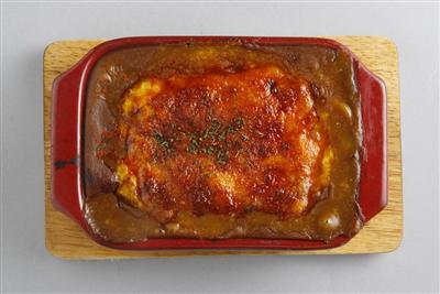卓上にある自店製のスパイスをかけて辛さが調整できる