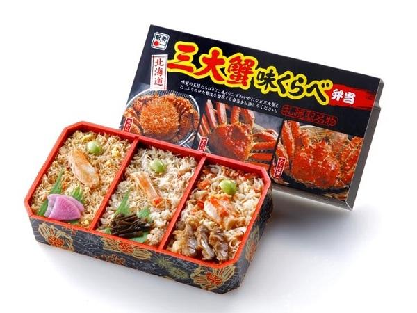 三種類の蟹の味わいを一度に食べ比べられる「三大蟹味くらべ弁当」 「三大蟹味くらべ弁当」の中身とパッケージ