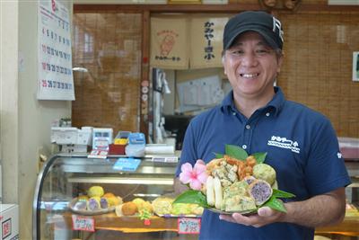 笑顔が素敵な店主の大城文博さん