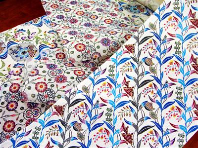 宮城守男さんの作品。沖縄の風景をモチーフにした美しい紅型の帯